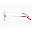 Détail métal doré – brillance et finesse chez luxe optique.webp