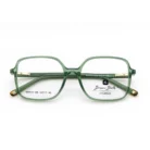 Lunette Bruno Botti carrée couleur verte exposée chez luxe optique.webp