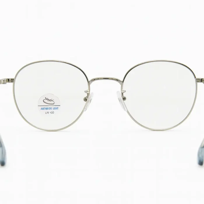 Monture ronde métal homme Titanium élégante – Showroom Luxe Optique Dakar.webp