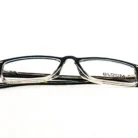 Profil latéral – Élégance masculine chez luxe optique