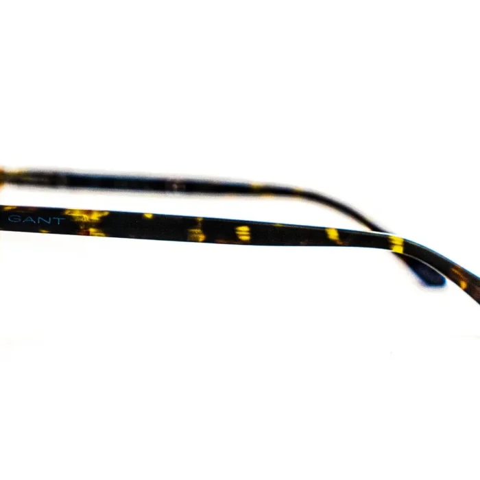 Détail branche en plastique acétate effet léopard Détail branche en plastique acétate effet léopard