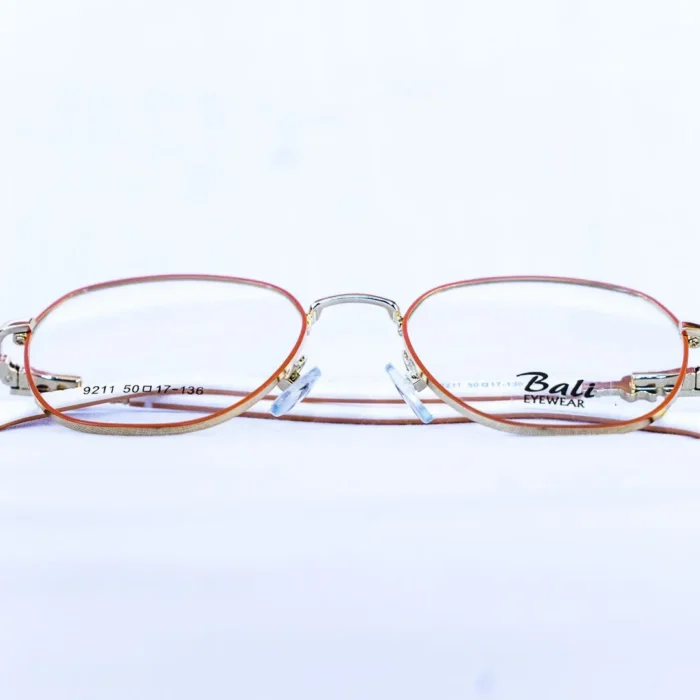 Vue latérale des lunettes Bali enfant couleur orange | boutique Luxe Optique